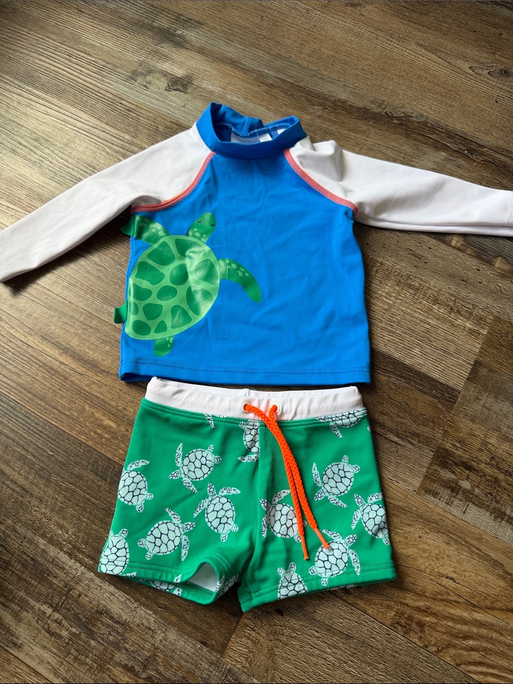 NWOT baby Boden turtle rashguard and swim short set size 3-6m